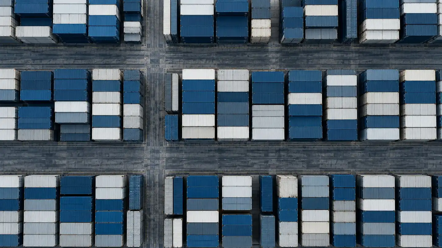 Aerial view of rows of shipping containers